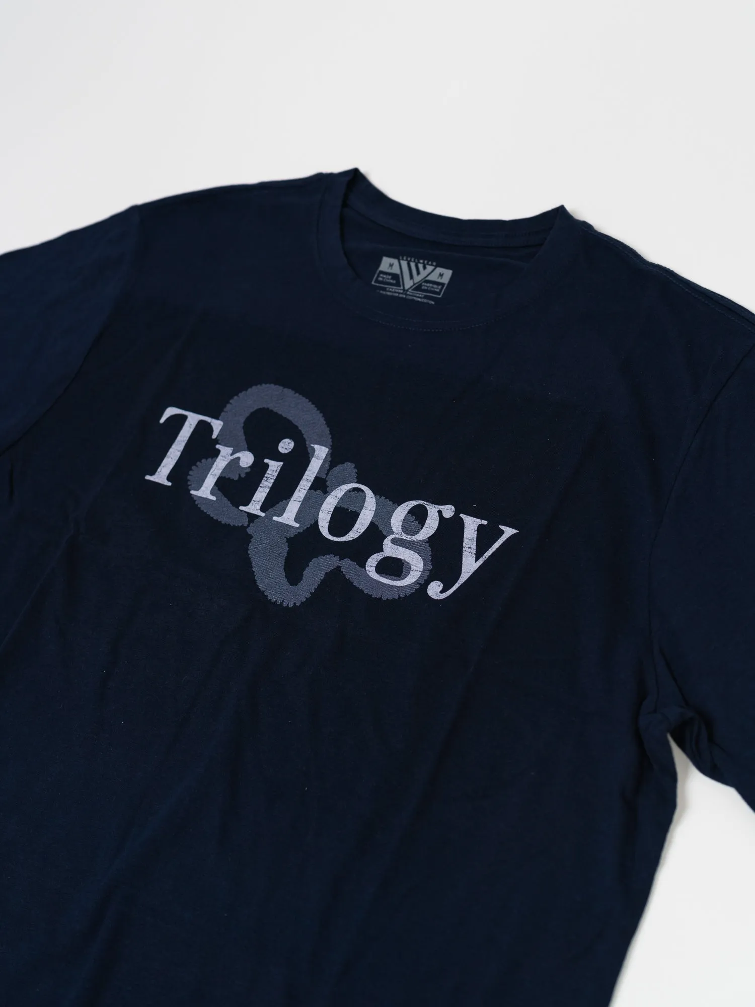 Trilogy Tee