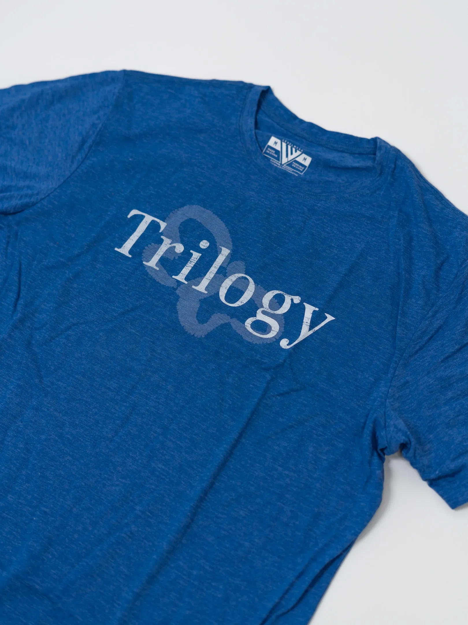 Trilogy Tee